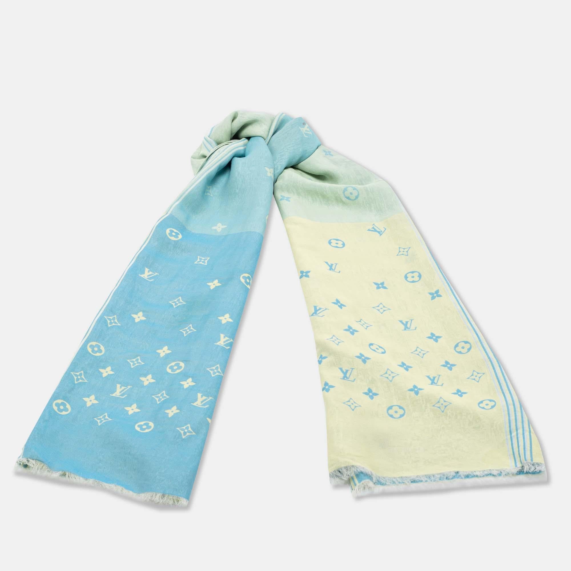 Coming from the house of Louis Vuitton is this lovely scarf that will highlight any outfit you choose. Created from Monogrammed silk, it comes in shades of blue and yellow. Grab it today, and flaunt it like a fashionista!

