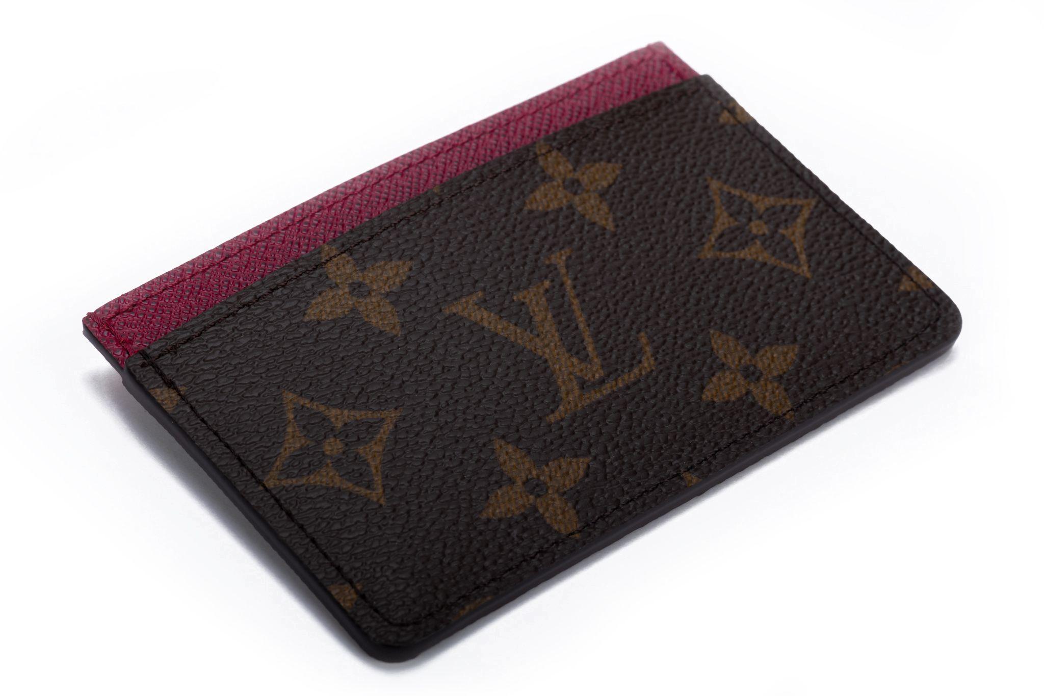 Louis Vuitton brand new unisex credit card case, brown and magenta . Comes with box and original dustcover.