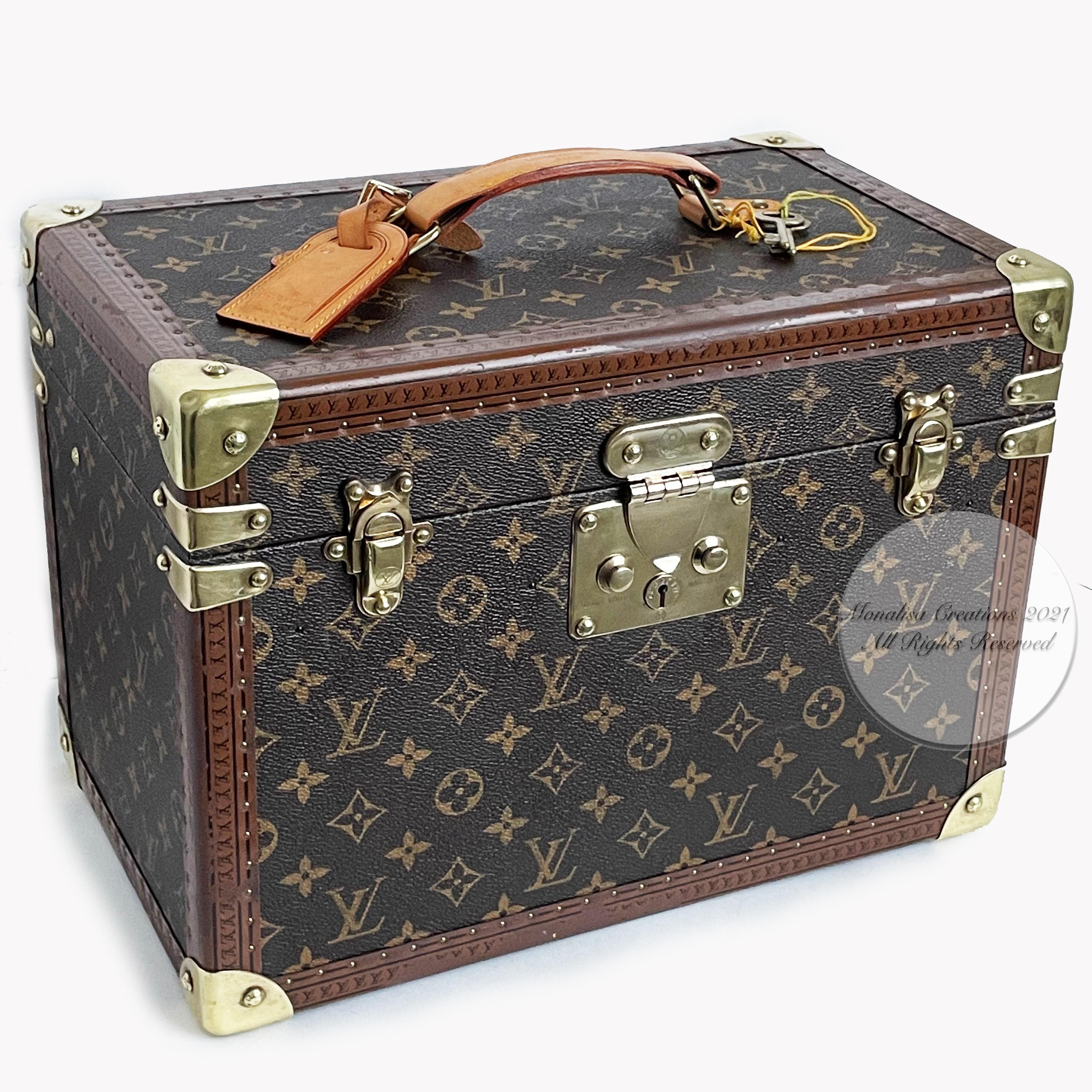 Authentic, preowned, vintage Louis Vuitton Train Case Boite Pharmacie Vanity or Beauty Case likely from the 90s. Last known retail price: $8650. Monogram canvas exterior, lined in washable canvas. Comes w/removable bottle holder, mirrored jewelry