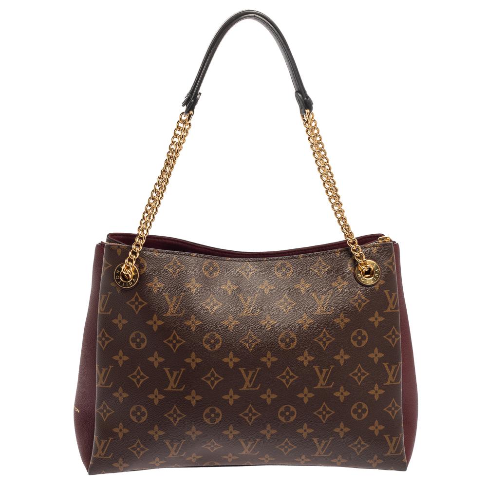 A handbag should not only be good-looking but also functional, just like this Surene MM bag from Louis Vuitton. Crafted from Monogram canvas & leather, this gorgeous number has a spacious Alcantara interior. It features two chain-link handles with