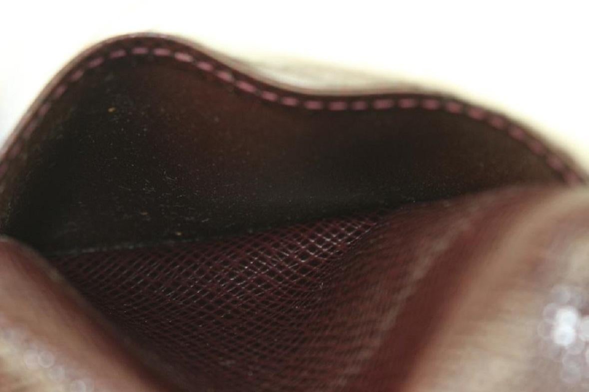 Bordeauxfarbenes Taiga-Leder Portemonnaie mit Kartenklappe und Taschenregal 921lv66 von Louis Vuitton 5