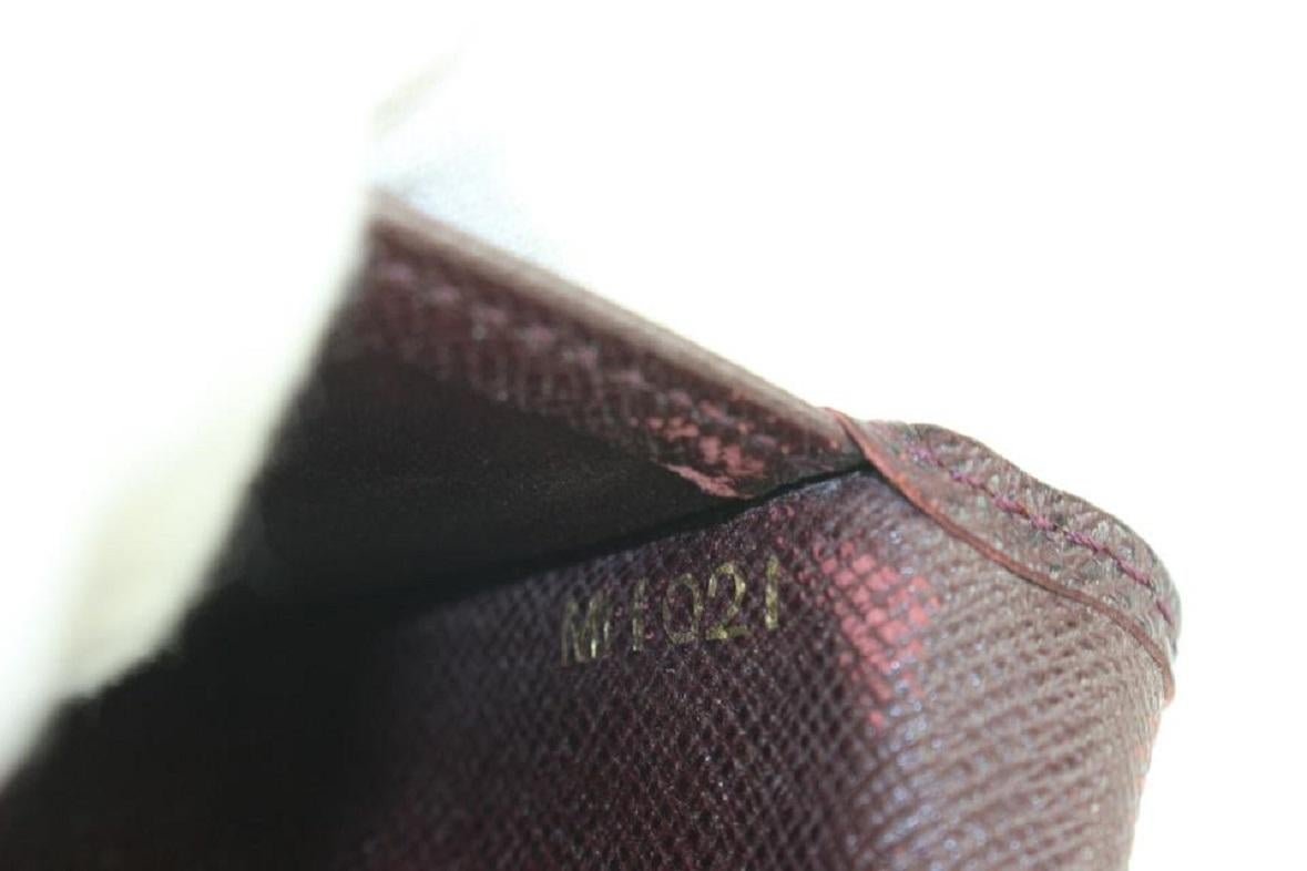 Bordeauxfarbenes Taiga-Leder Portemonnaie mit Kartenklappe und Taschenregal 921lv66 von Louis Vuitton Damen