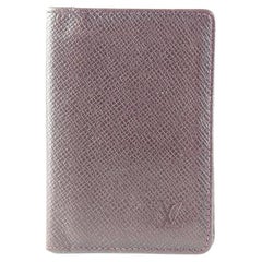 Portefeuille porte-cartes Louis Vuitton en cuir bordeaux Taiga 12l520