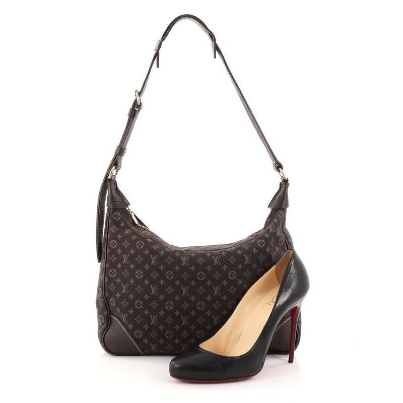 This authentic Louis Vuitton Boulogne Handbag Mini Lin showcases a lightweight and simple design perfect for everyday use. Crafted from dark brown monogram mini lin canvas, this elegant shoulder bag features an adjustable shoulder strap, dark brown