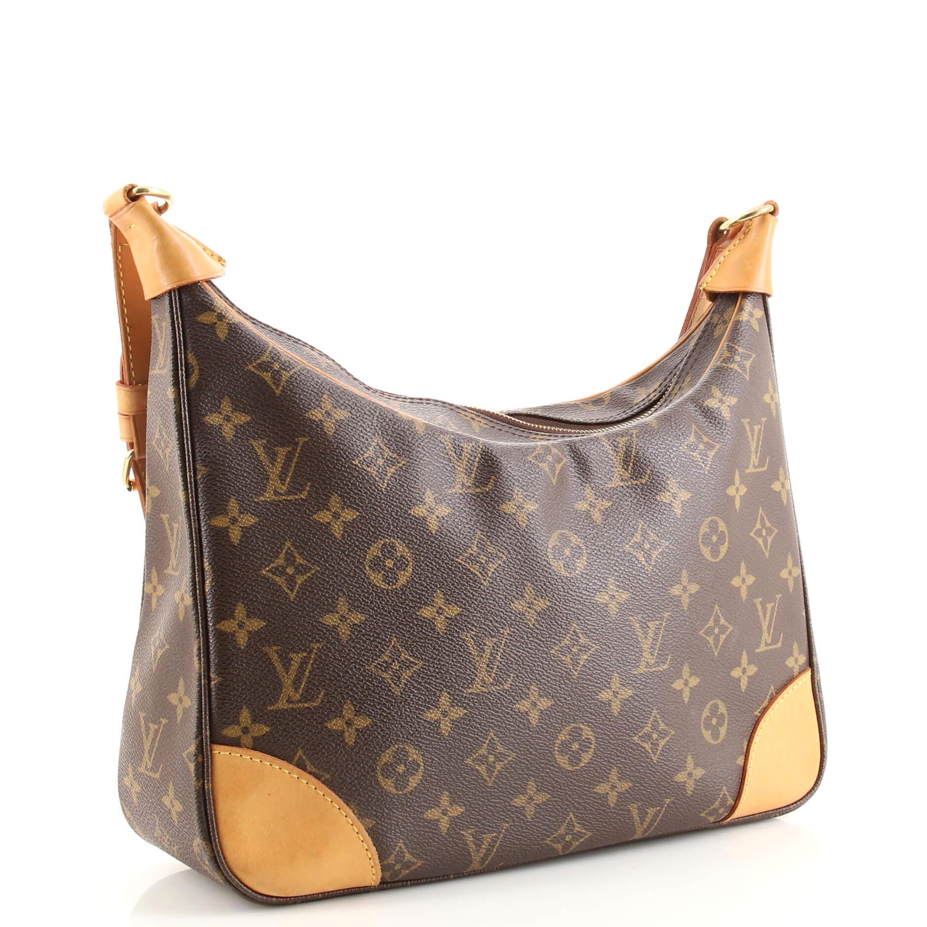 Condition: Very good. Odor in interior. Wear on base corners, loss of shape on opening trim, moderate darkening, wear, scuffs and watermarks on leather trims and strap. Light wear and scuffs in interior, scratches and tarnish on