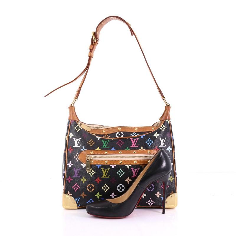 This Louis Vuitton Boulogne Handbag Monogram Multicolor, crafted from black multicolor monogram coated canvas, features an adjustable shoulder strap and gold-tone hardware. Its top zip closure opens to a taupe microfiber interior with zip and slip