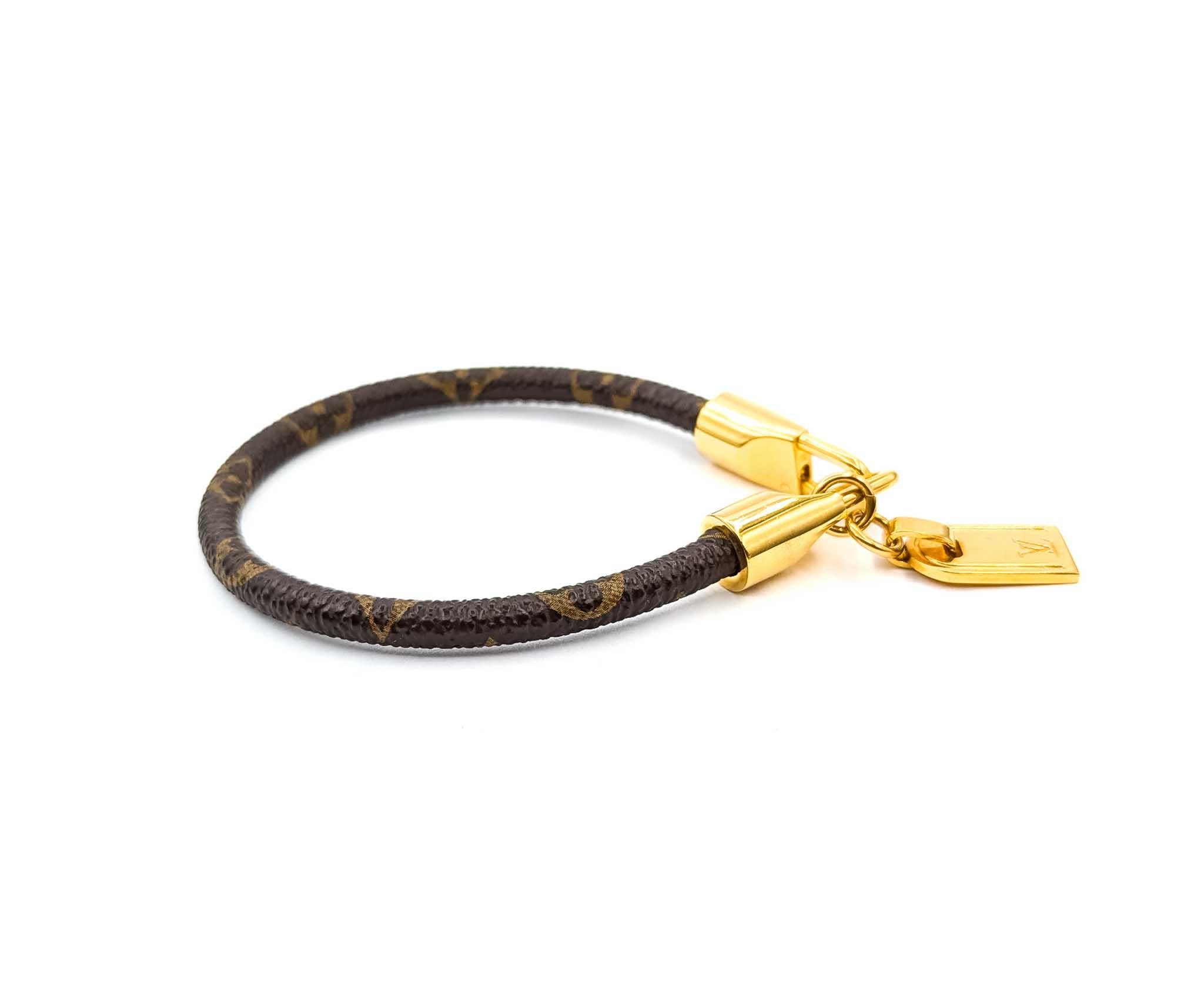 Elevate your style with this pre-owned Louis Vuitton Bracelet from the Rack It Monogram collection. Crafted with the iconic monogram design, this bracelet is a timeless piece that adds a touch of luxury to any ensemble. Its elegant and versatile
