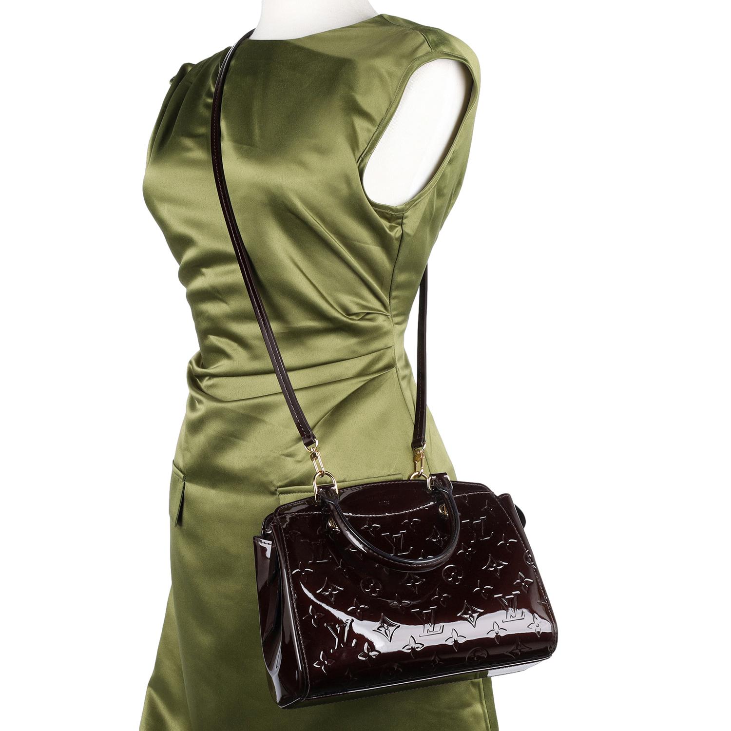 Authentic Louis Vuitton Brea PM Amarante monogram Vernis leather shoulder bag. Features Louis Vuitton embossed shiny Vernis patent leather in dark maroon. This handbag features rolled top handles, an optional shoulder strap, and polished brass