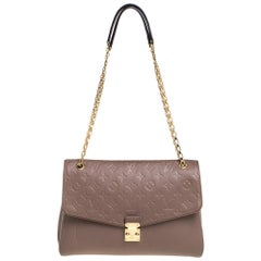 Louis Vuitton Brown Monogram Empreinte Saint-Germain PM Beige Leather Metal  ref.182763 - Joli Closet