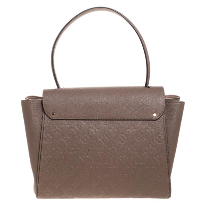 Flaunt this Louis Vuitton Trocadero bag like a fashionista! Crafted from their signature Monogram Empreinte leather, this bag was made in France and features an Alcantara-lined interior, spacious enough to carry all your essentials. The bag is