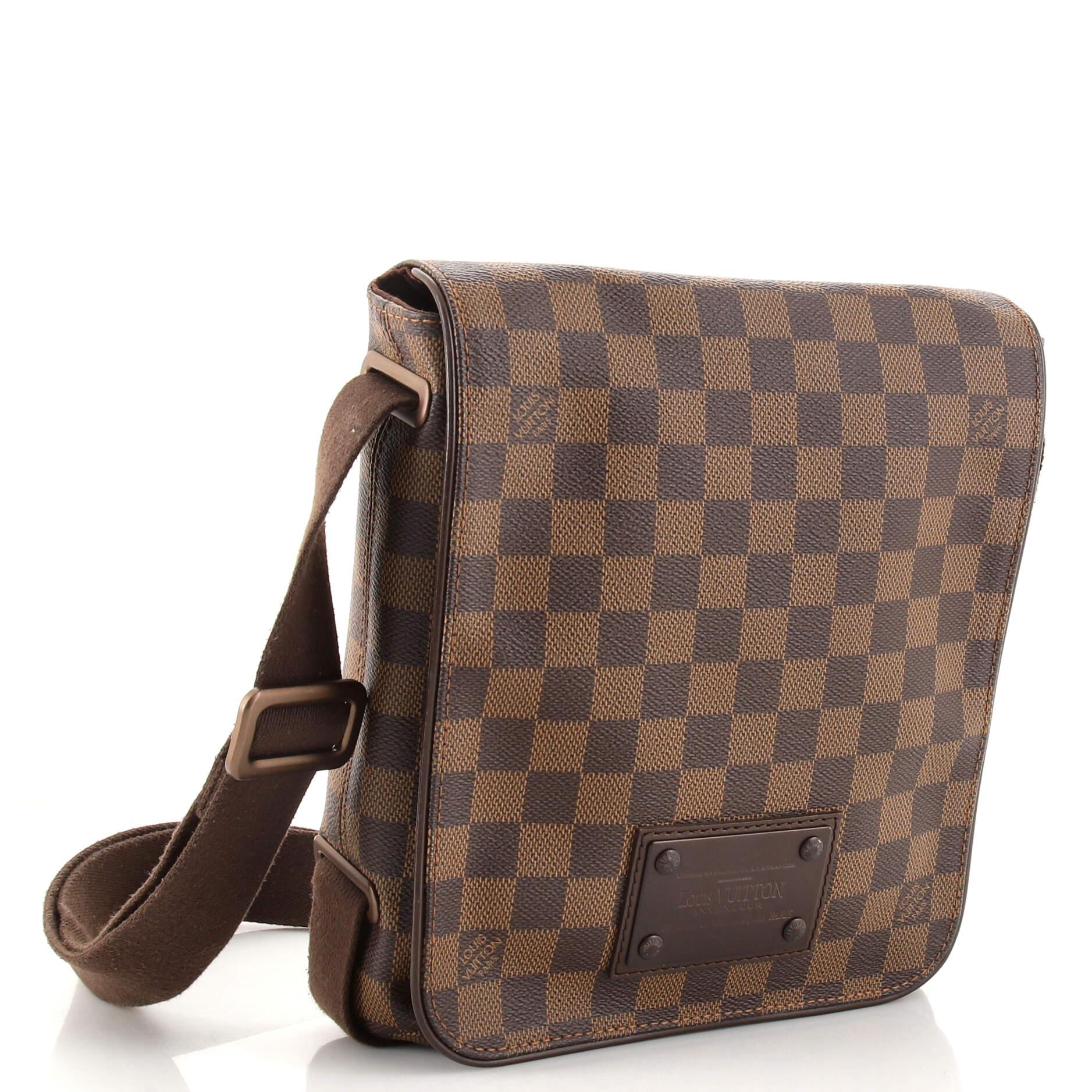 Condition: Very good. Odor in interior. Minor creasing on exterior, wear and darkening on base corners, pilling on strap. Slight cracking on flap opening corners, minor wear underneath flap and in interior, scratches on hardware.
Accessories: No