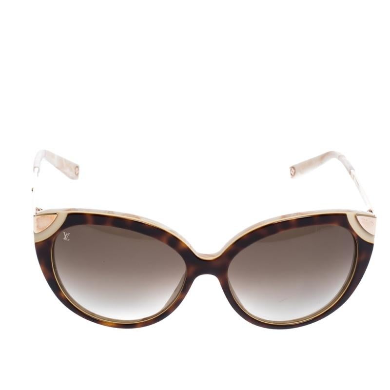 Louis Vuitton cat-eyes are one pair of sunglasses that you need to beat the heat in style. The sleek design and the shaded lenses protect your eyes from the harmful sun rays while looking like you were cutout of a magazine.

Includes:Original Case

