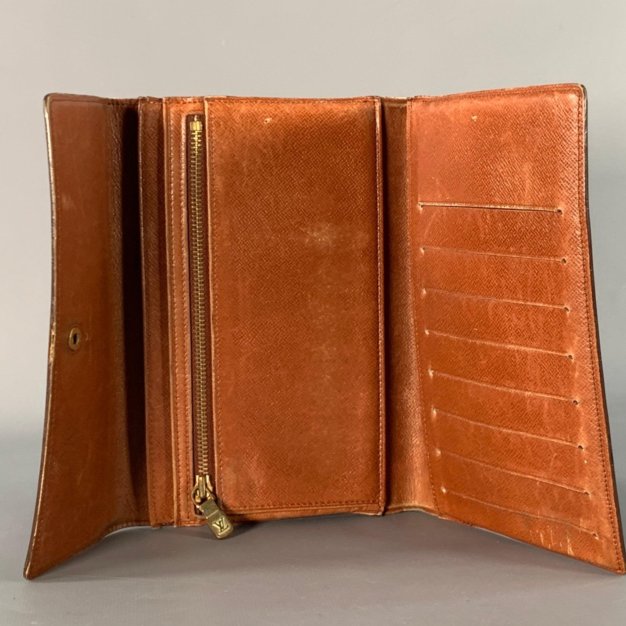 Marrone Portafoglio LOUIS VUITTON in tela rivestita con monogrammi in ottone marrone in vendita