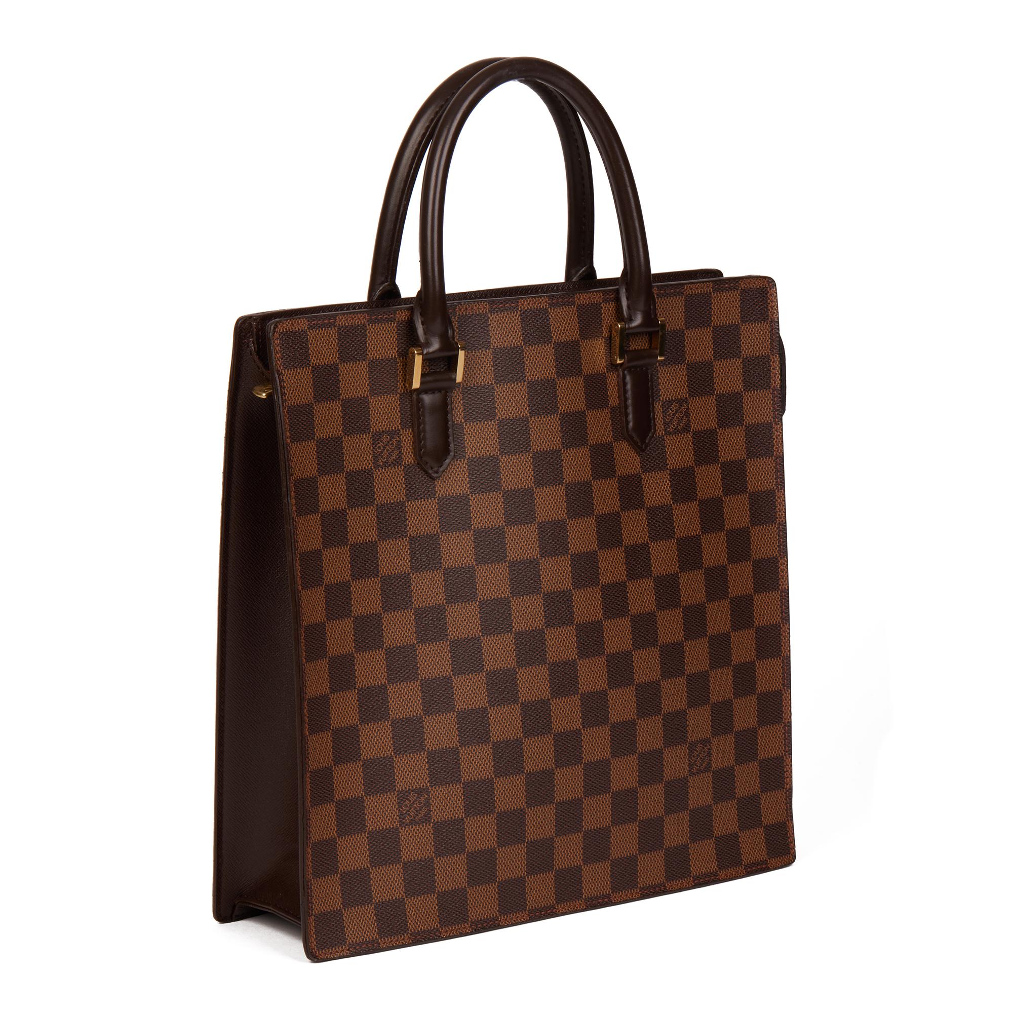 LOUIS VUITTON
Brown Coated Canvas Damier Ebene and Brown Calf Leather Venice PM

Xupes Reference: HB4351
Serial Number: MI 1927
Age (Circa): 1997
Authenticity Details: Date Stamp (Made in France) 
Gender: Ladies
Type: Tote

Colour: Brown
Hardware:
