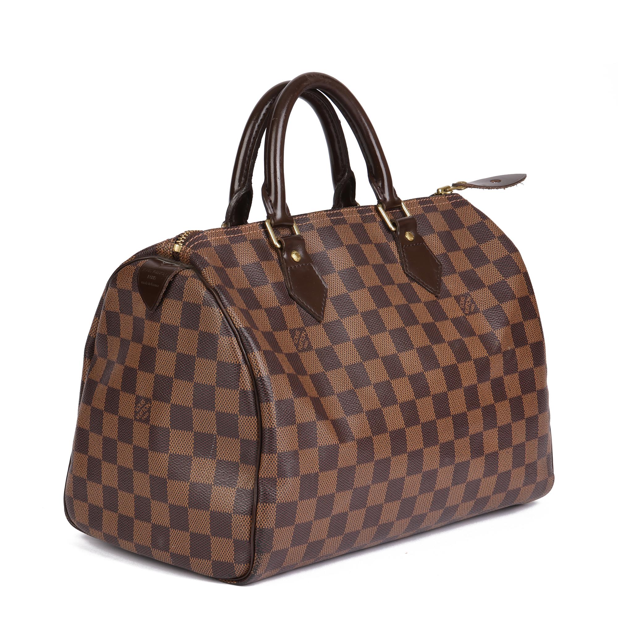 LOUIS VUITTON
Brown Damier Coated Canvas & Brown Calfskin Leather Speedy 30

Serial Number: DU1099
Age (Circa): 2009
Accompanied By: Louis Vuitton Dust Bag
Authenticity Details: Date Stamp (Made in France)
Gender: Ladies
Type: Tote

Colour: