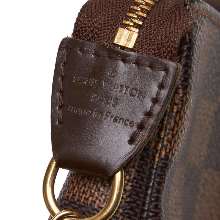 Louis Vuitton Brown Damier Ebene Mini Pochette Accessoires TB France For Sale at 1stdibs