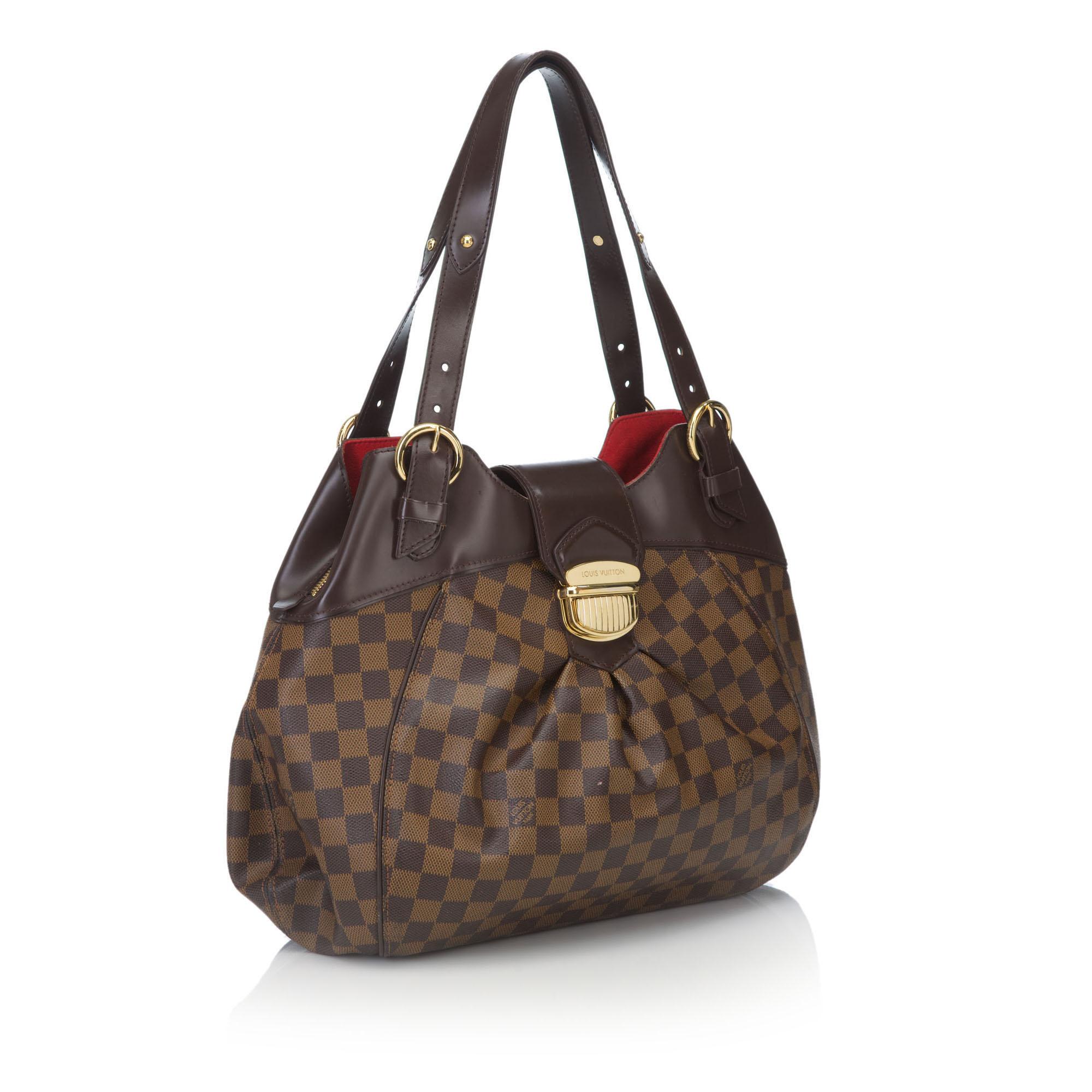 The Sistina GM features a damier canvas body, flat leather handles, front strap with push lock closure, interior compartments with top zip closure, and interior open pockets. It carries as AB condition rating.

Inclusions: 
Dust Bag


Louis Vuitton