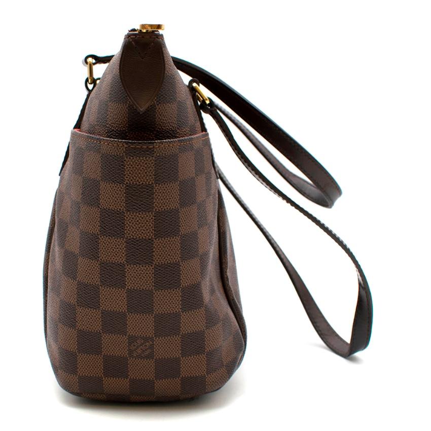 Louis Vuitton - Brown Damier Ebene Totally PM Bag

- red textile lining
- leather shoulder straps
- gold hardware
- zip closure 
- two open slip pockets on the sides
- three slip pockets inside 

- leather trim, damier ebene coated canvas, textile