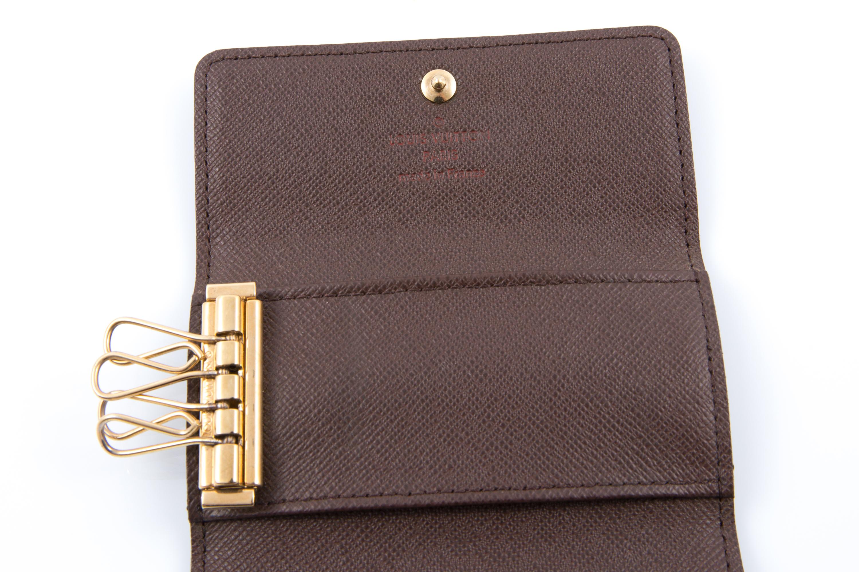 Porte-clés à quatre crochets Louis Vuitton Monogramme Damiers marron Unisexe en vente