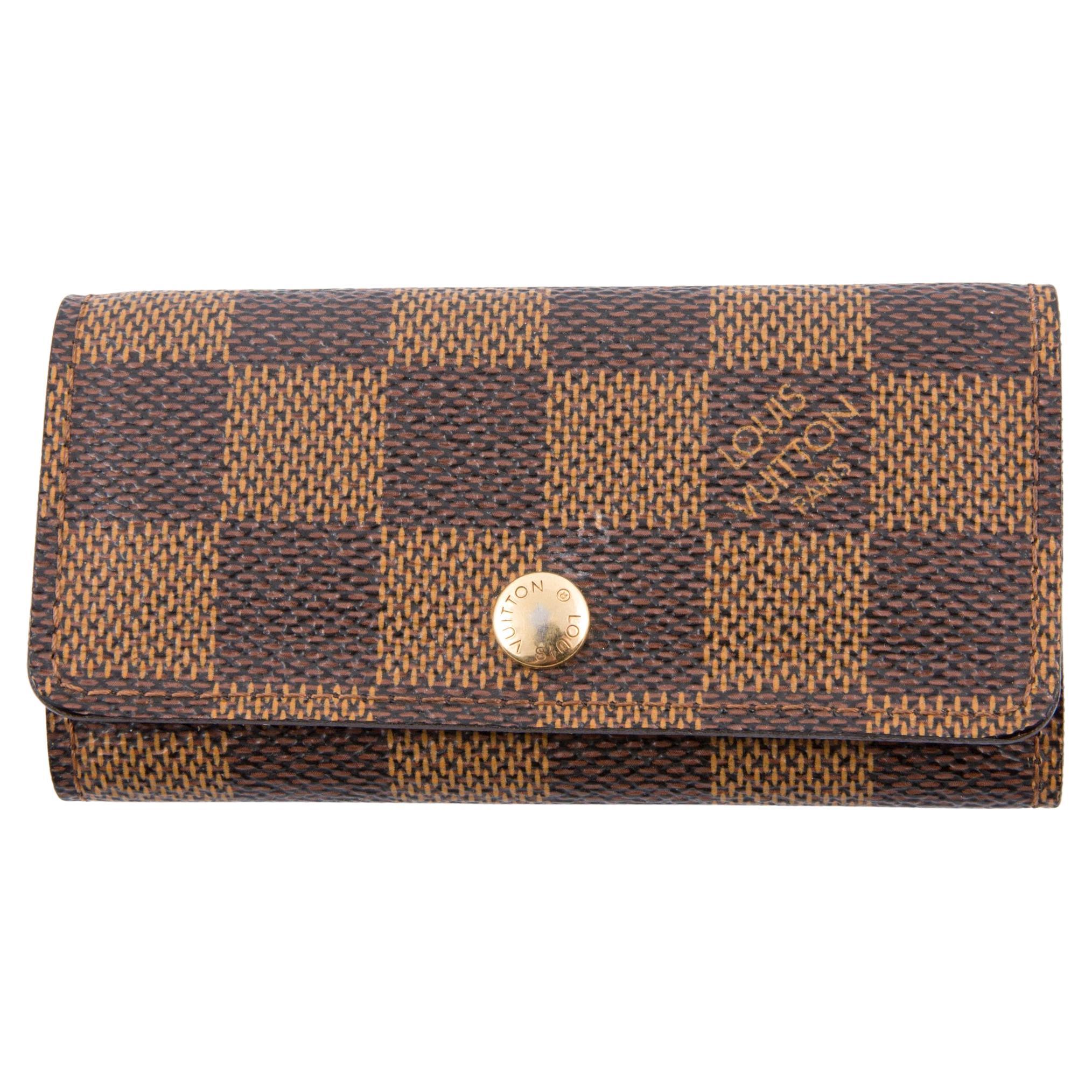 Porte-clés à quatre crochets Louis Vuitton Monogramme Damiers marron en vente