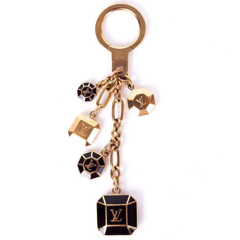 Lv Keyring LOUIS VUITTON brown enamel and gold Keyring Keychain at 1stDibs