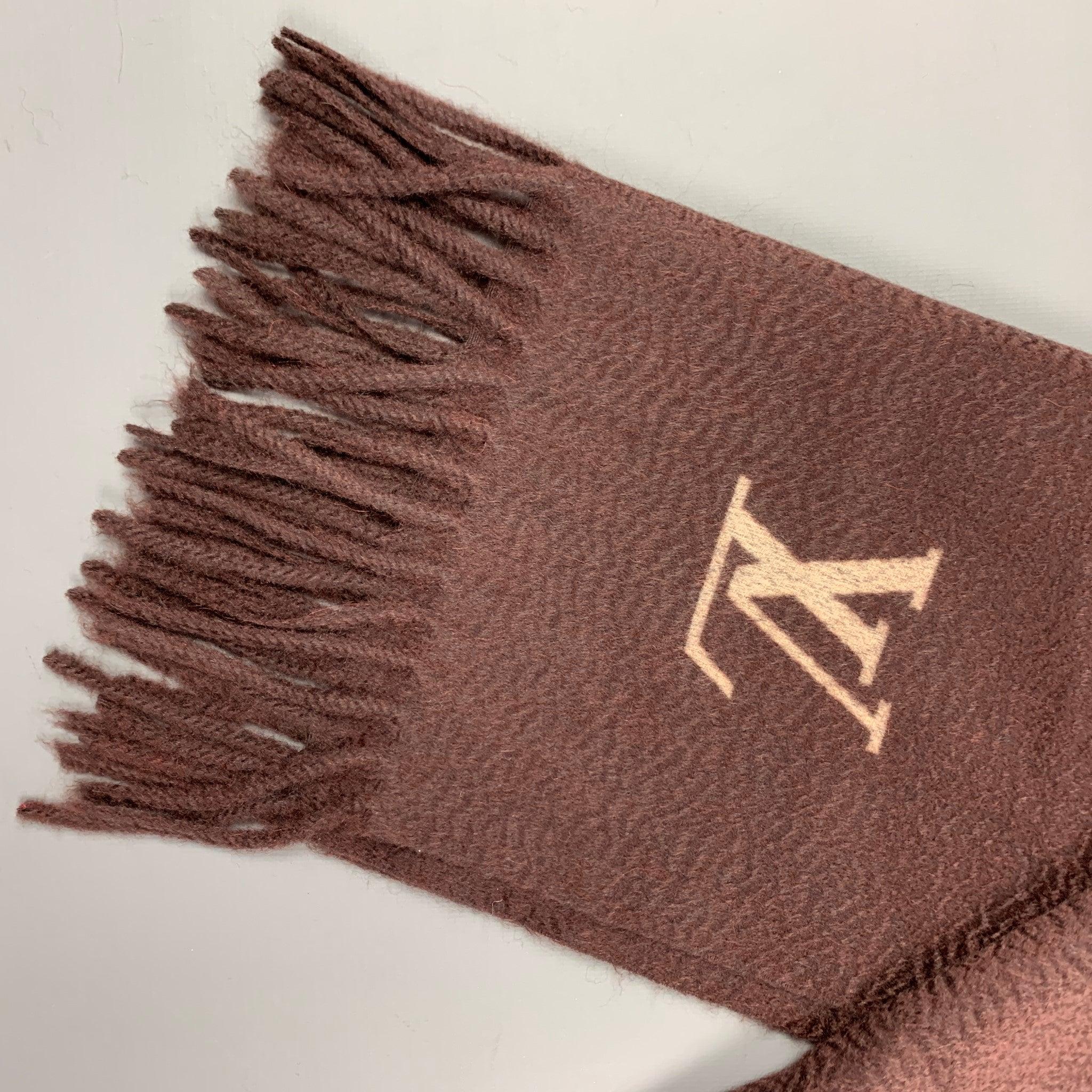LOUIS VUITTON scarf comes in a brown knitted cashmere featuring a logo detail and a fringe trim. Made in Italy.
Very Good
Pre-Owned Condition. 

Measurements: 
  66 inches  x 15 inches 
  
  
 
Reference: 116528
Category: Scarves
More Details
   