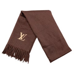 Lot - Louis Vuitton Paris 65% wool 35% cashmere vintage designer brown  monogram scarf with metallic thread and original tag. 75H x 28W