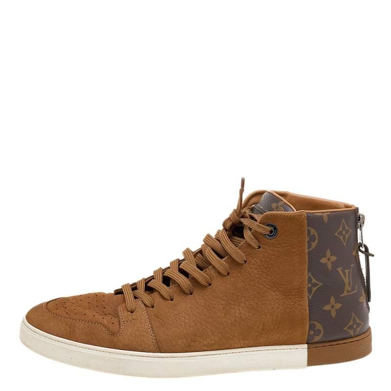 Grant your feet complete comfort without compromising on style with these sneakers from the House of Louis Vuitton. They are designed using brown leather as well as monogram canvas and showcase lace-up vamps and zip details.

