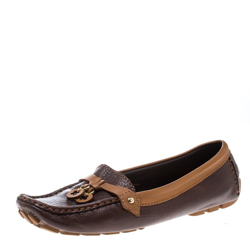 Louis Vuitton loafers are loved by men and women worldwide and are perfect for making a fashion statement. These brown loafers are crafted from leather and feature a chic design. They flaunt squared toes, leather charms on the vamps, comfortable