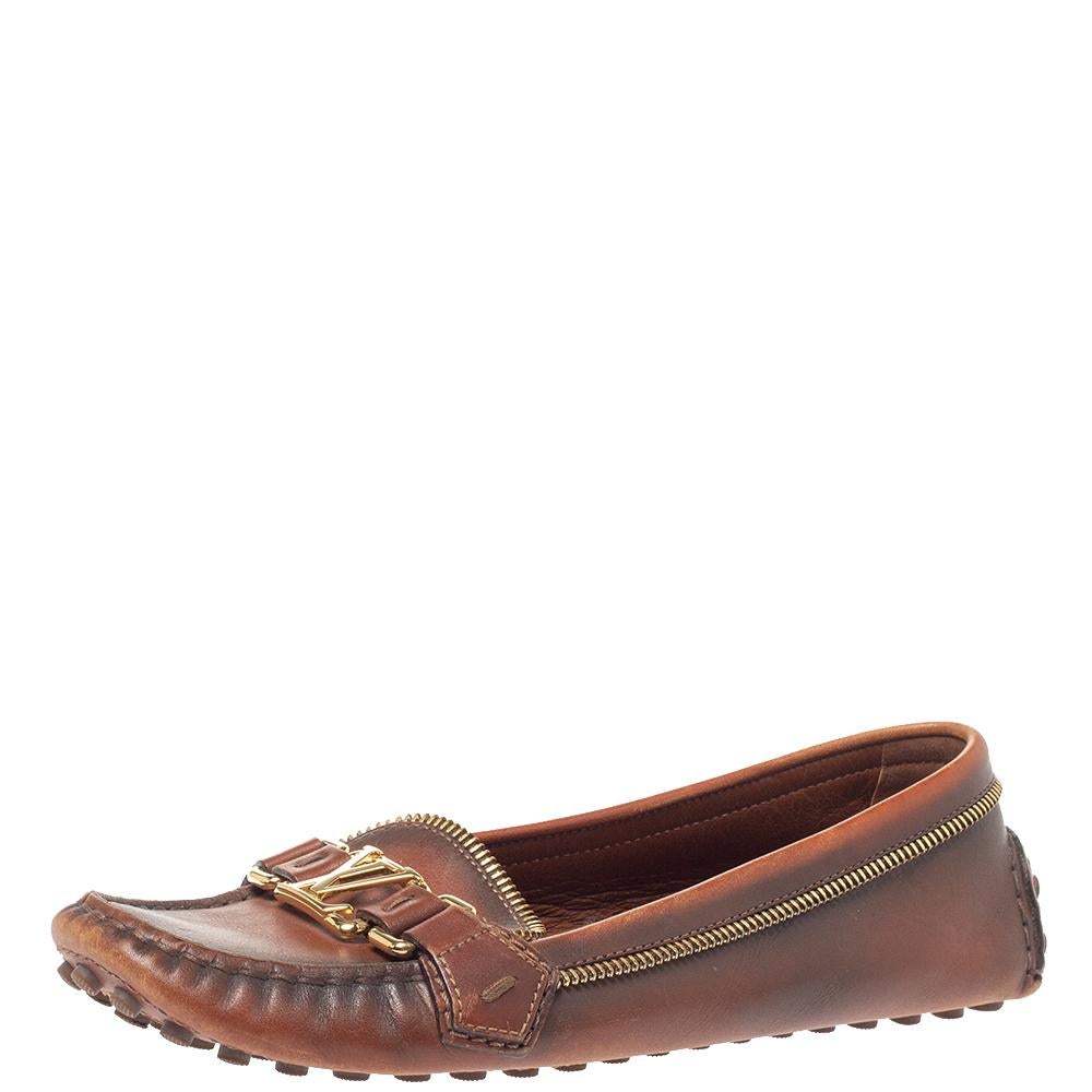 Louis Vuitton's loafers are loved by men and women worldwide as they are perfect for making a fashion statement. These brown loafers are crafted from leather and feature a chic design. They flaunt LV motifs on the vamps, refreshing design update of