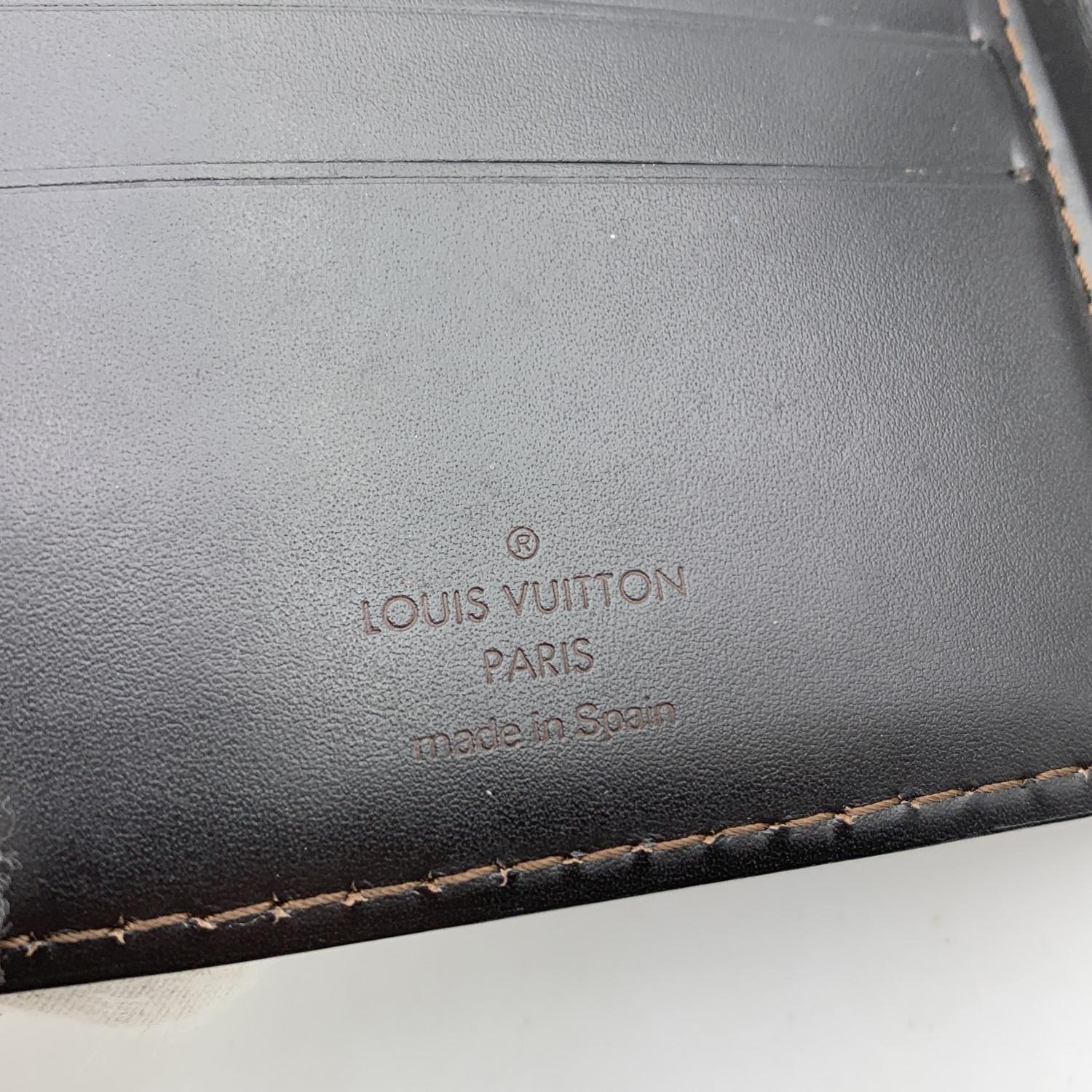 Women's or Men's Louis Vuitton Brown Leather Utah Men Bifold Wallet