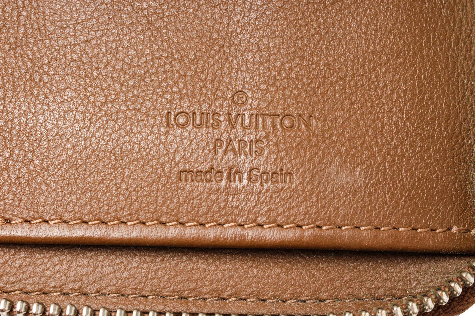 Louis Vuitton Brown Leather Vertical Zippy Wallet with leather, gold-tone  1