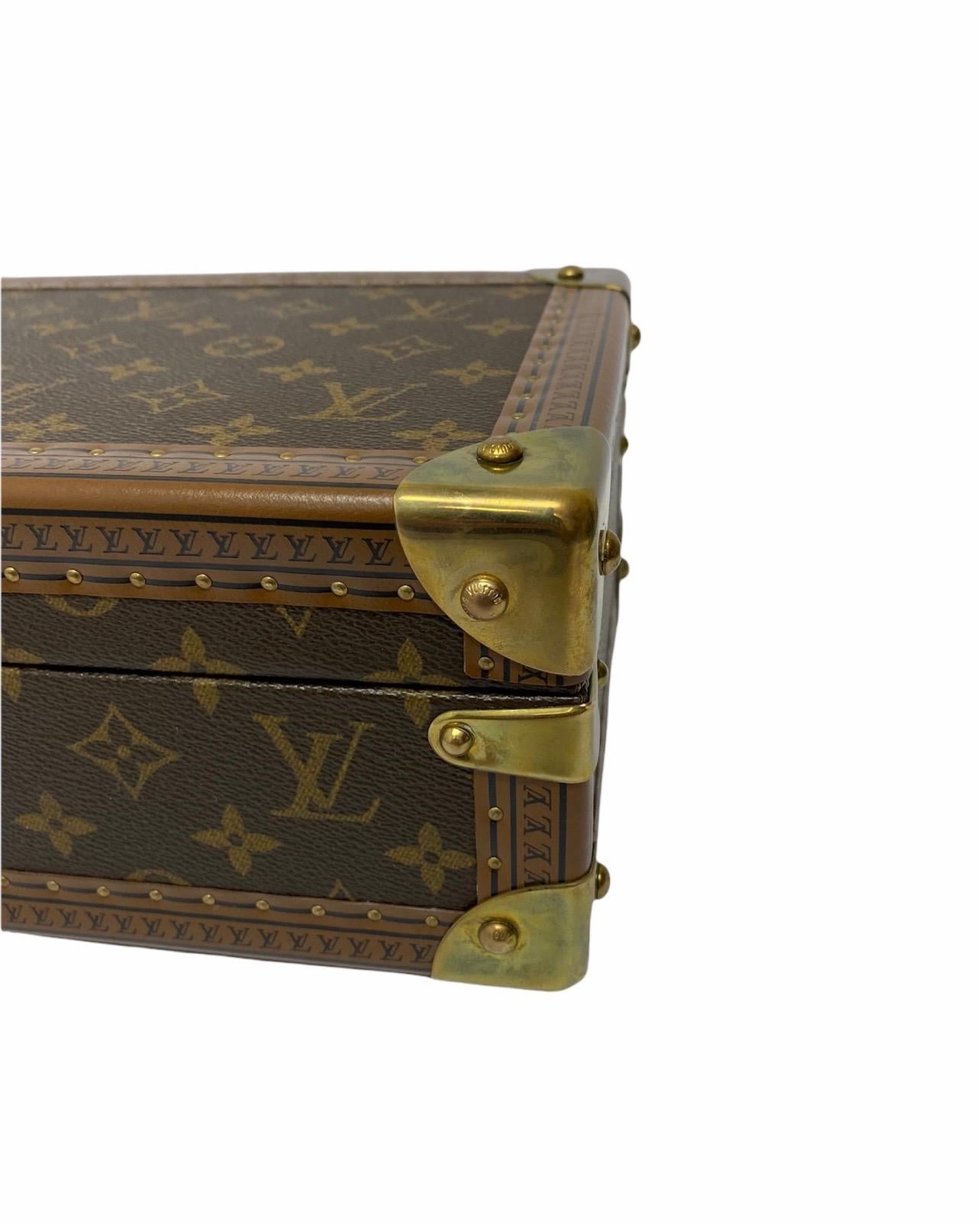 Louis Vuitton watch case made of Monogram canvas, natural cowhide finishes, microfiber lining. It features studded reinforced leather trims and golden brass corners.

The box for 8 watches can be easily stored in the safe or suitcase and includes a