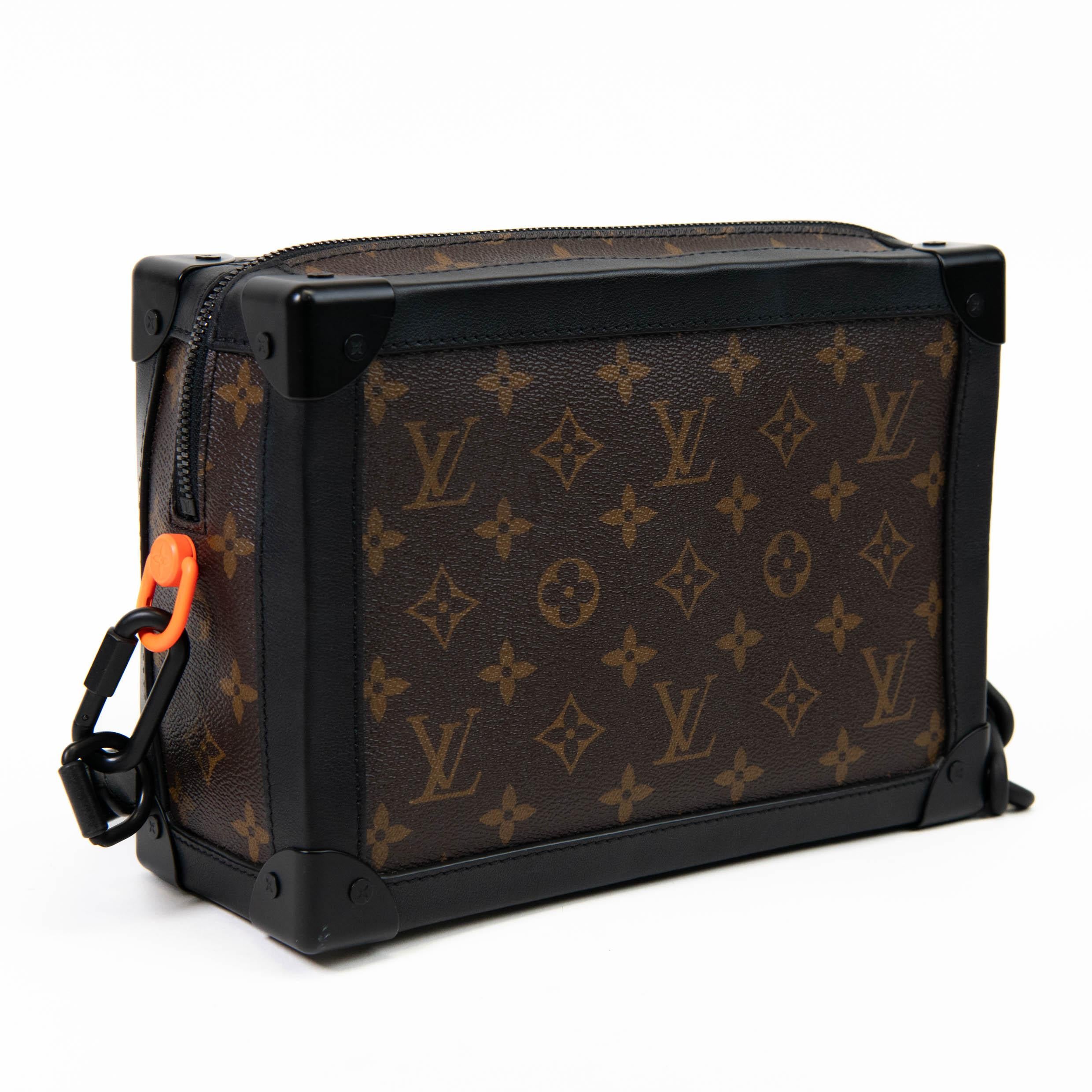 100% Authentic

This chic shoulder bag from Virgil Abloh's collection is featured in classic Louis Vuitton monogram canvas in brown. The bag features an optional adjustable black shoulder strap, bright orange hardware, and matte black lock. This
