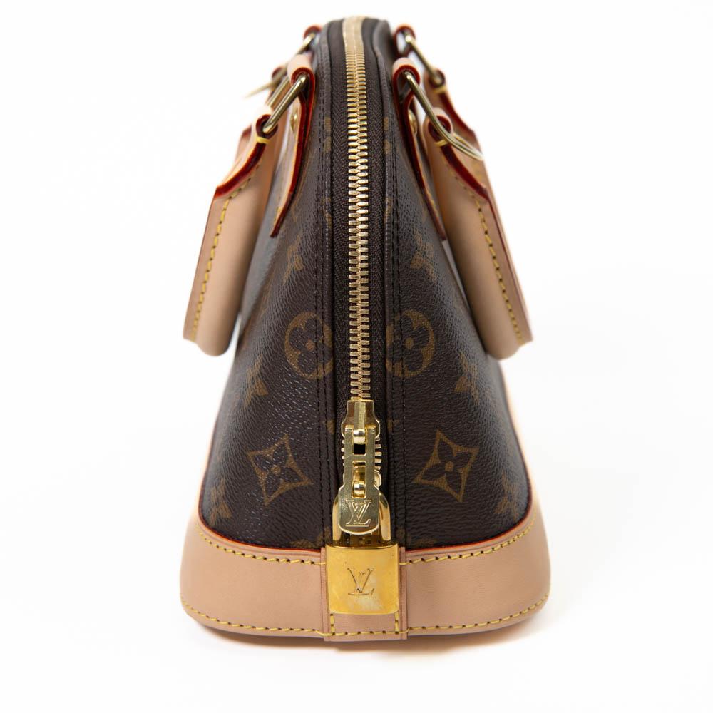 100% Authentic 

This small tote is crafted of classic Louis Vuitton monogram coated canvas. The bag features vachetta cowhide leather trim including a solid base, rolled leather top handles, an optional shoulder strap with polished brass hardware,