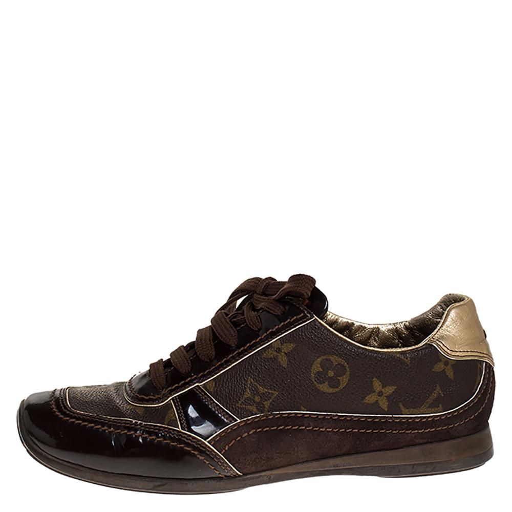 Your casual style will be elevated with a luxe touch thanks to these brown sneakers. The sneakers are made from monogram canvas and suede. Designed by Louis Vuitton, they feature round toes, rubber soles and lace-up vamps.

