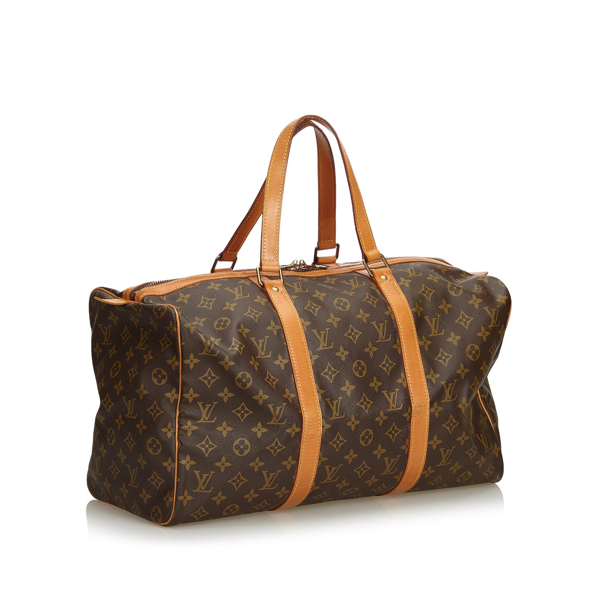 The Sac Souple 45 features a monogram canvas body, flat leather handles and a top zip closure. It carries as B condition rating.

Inclusions: 
This item does not come with inclusions.


Louis Vuitton pieces do not come with an authenticity