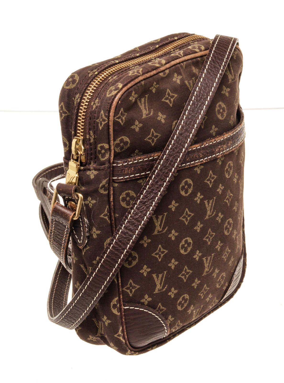 Louis Vuitton Brown Monogram Canvas Danube Crossbody Bag with monogram canvas, gold-tone hardware, trim tan vachetta leather, interior slip pocket, adjustable shoulder strap and zipper closure.


42995MSC