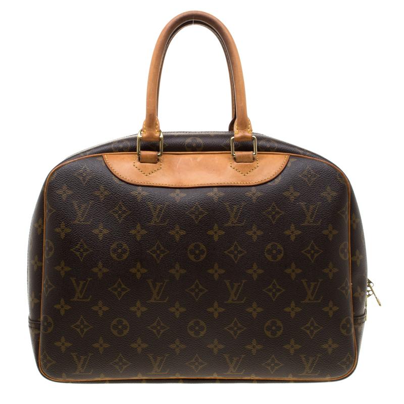 Designed to ensure that your belongings are organised, the Deauville bag from Louis Vuitton is the ideal travel companion. Made from signature monogram canvas and tan leather trims, it is equipped with top leather handles and can be accessed by