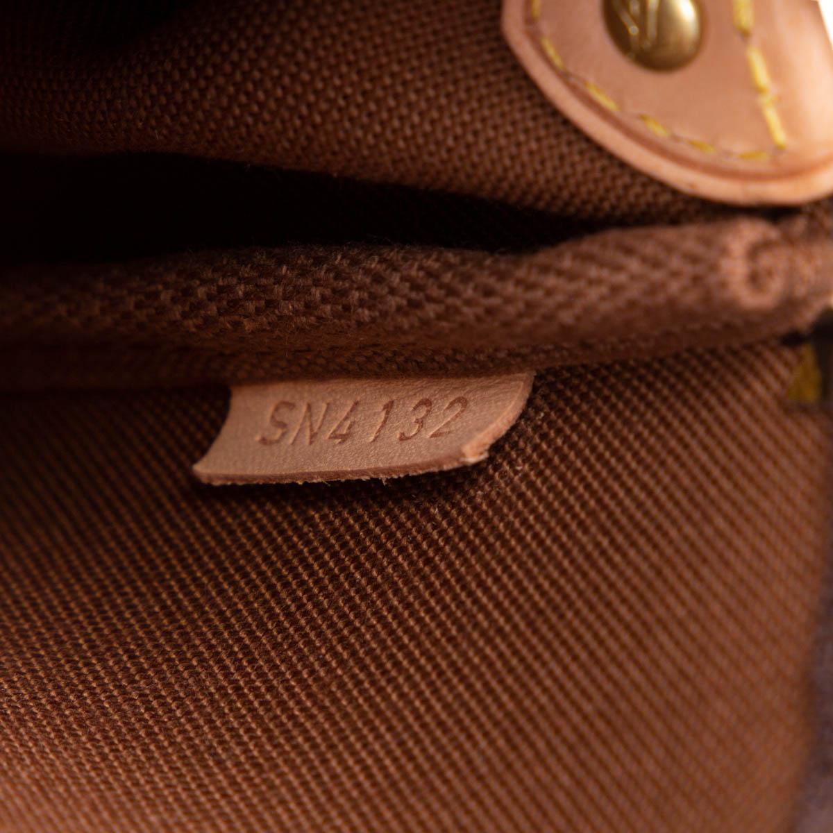 LOUIS VUITTON brown Monogram Canvas EVA Clutch Bag In Excellent Condition In Zürich, CH