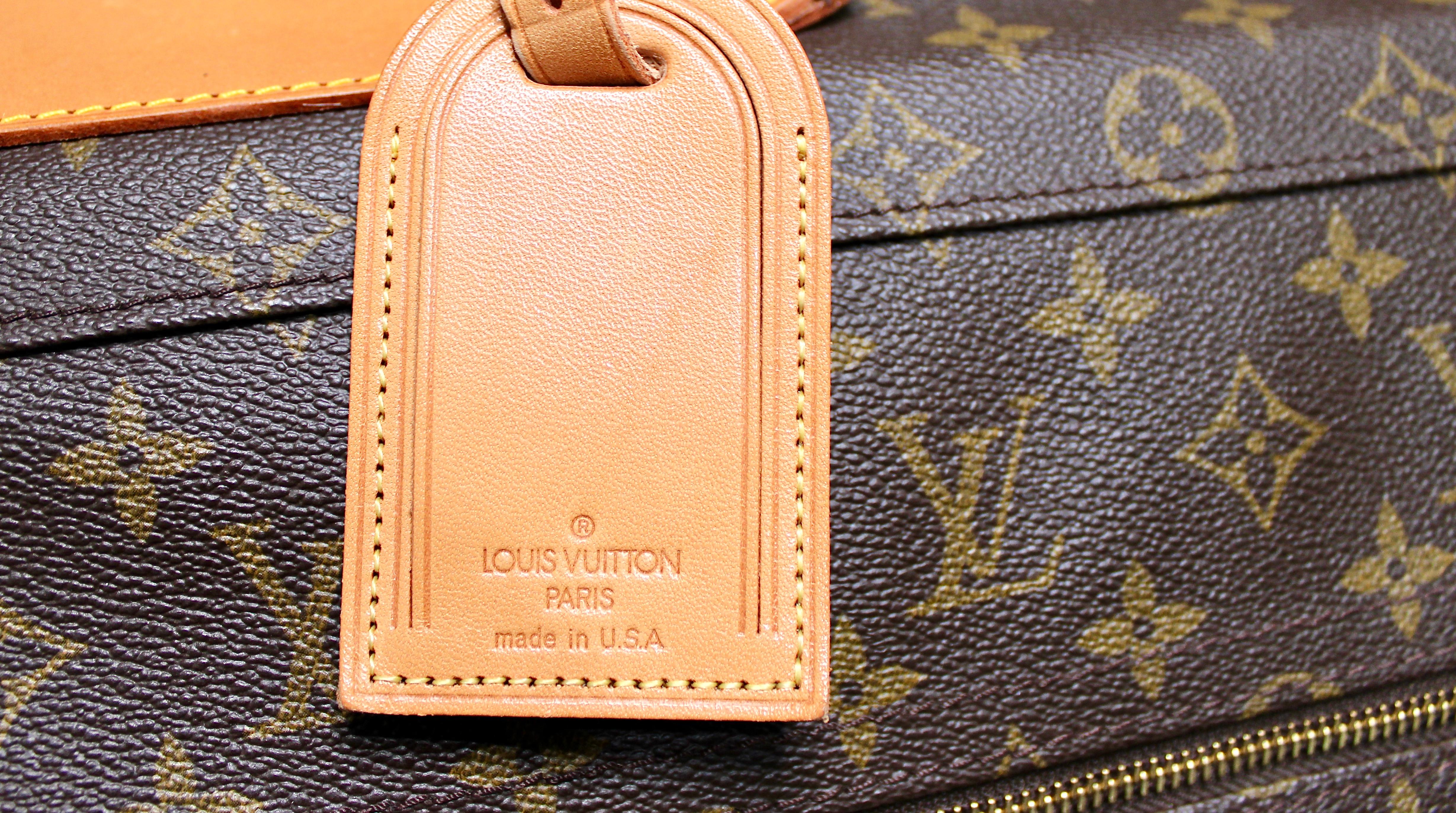 Bolsa de viaje de lona con monograma marrón Louis Vuitton en venta 7
