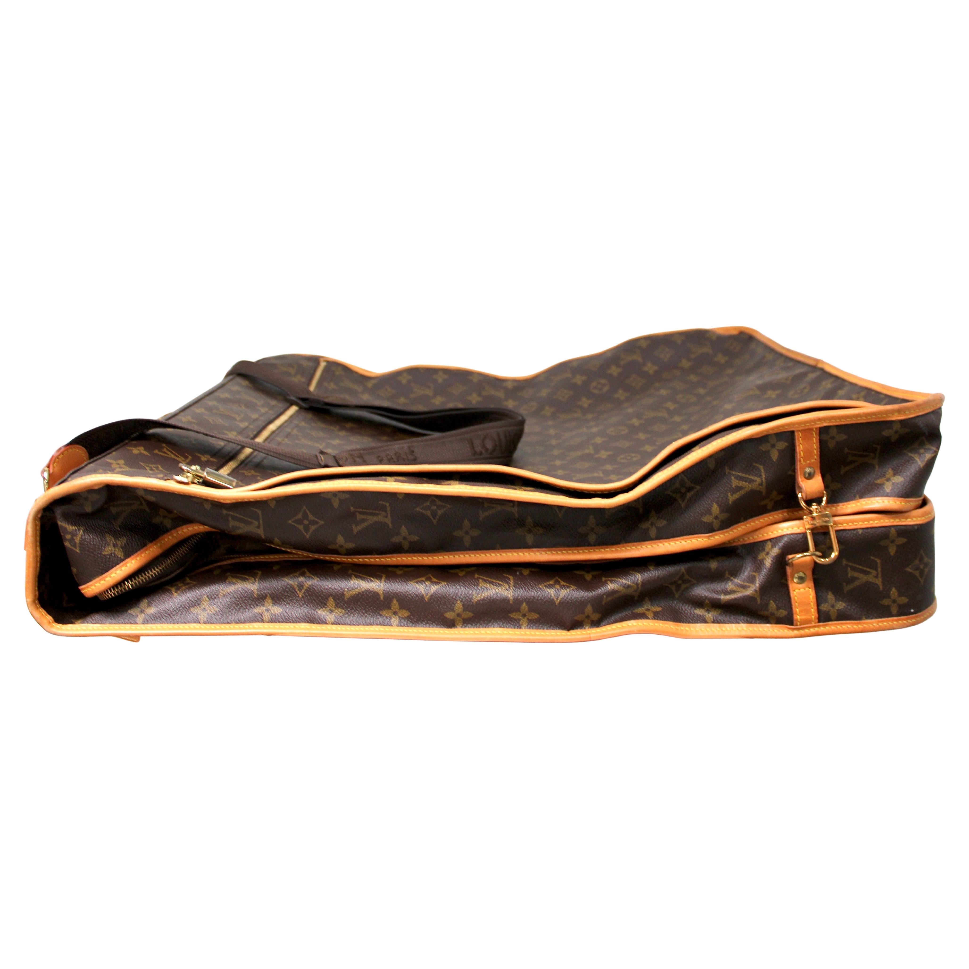 Bolsa de viaje de lona con monograma marrón Louis Vuitton en venta 8