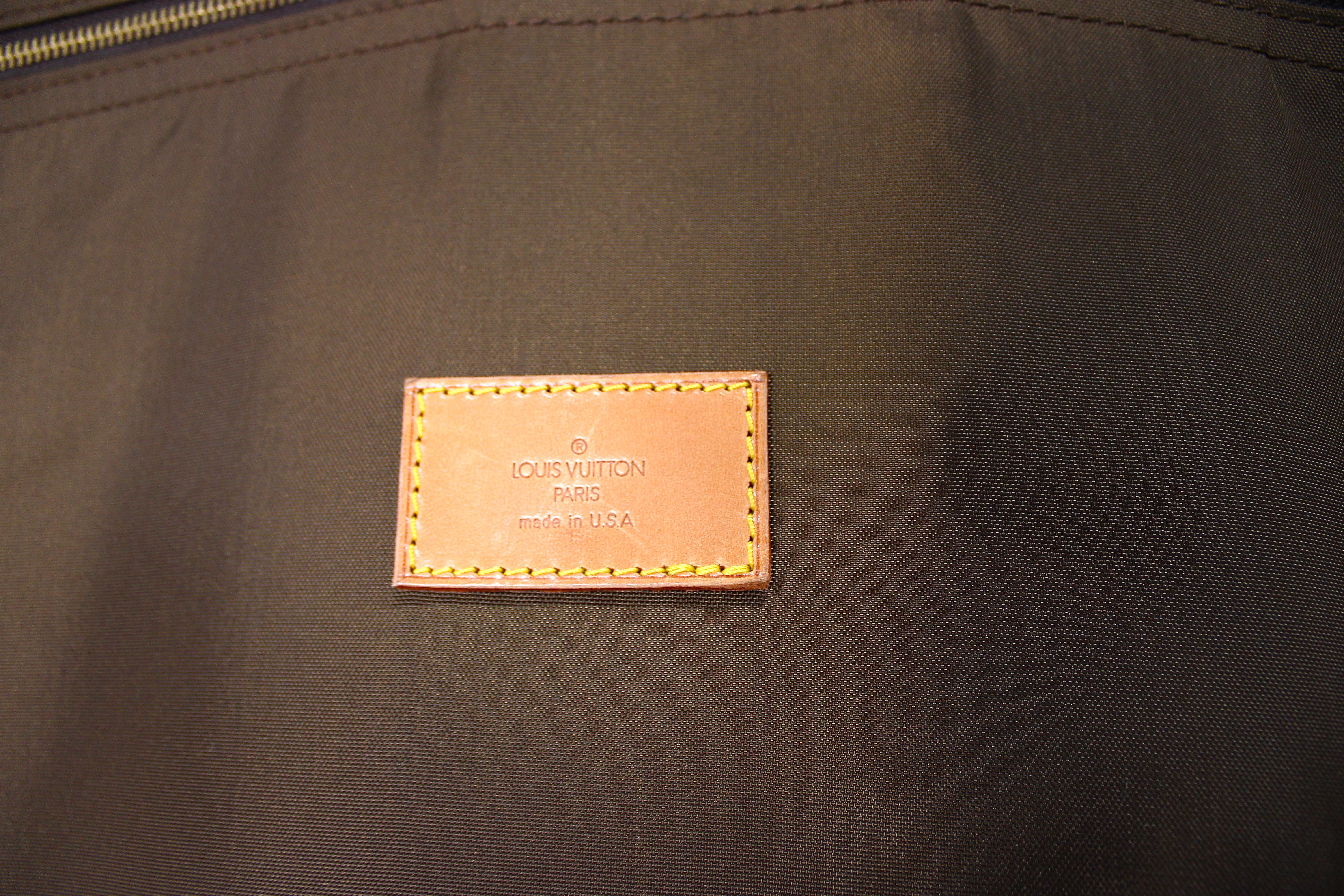 Bolsa de viaje de lona con monograma marrón Louis Vuitton en venta 10