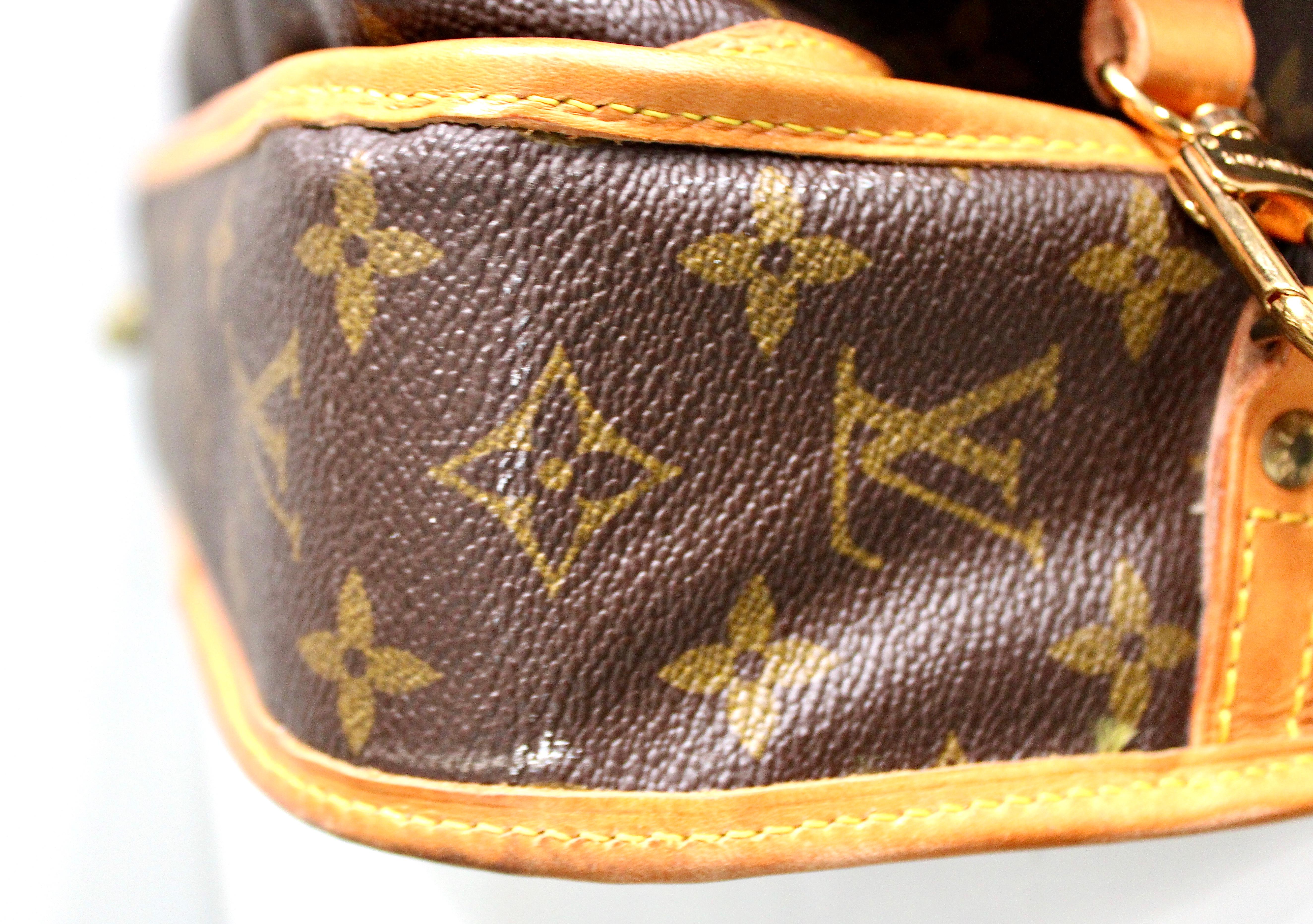 Bolsa de viaje de lona con monograma marrón Louis Vuitton en venta 4