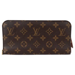 LOUIS VUITTON Portefeuille INSOLITE en toile Monogram marron