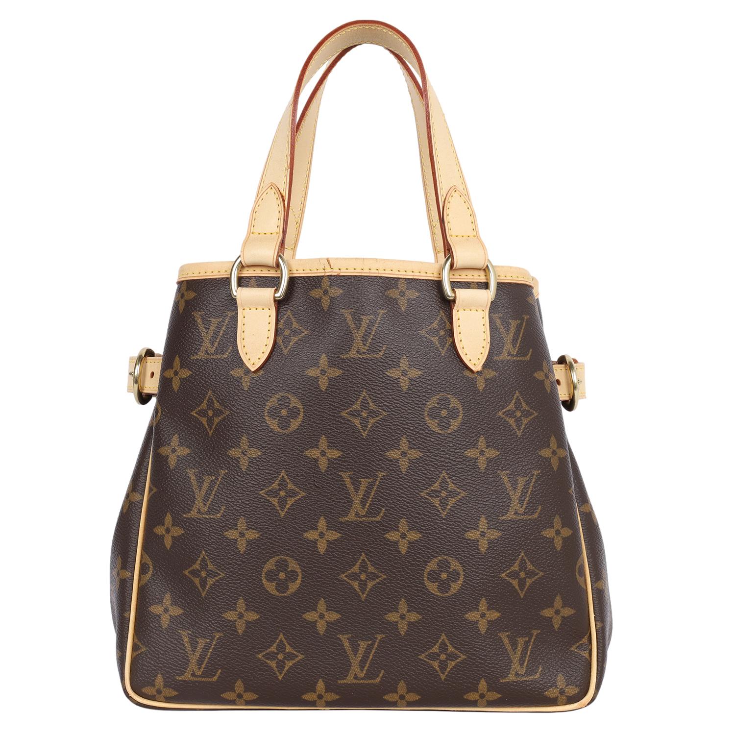 Authentic, pre-loved Louis Vuitton brown canvas monogram Batignolles vertical satchel. Features Louis Vuitton monogram canvas with leather trim and straps, adjustable buckle sides, and a large interior with pockets.

Handle drop 5.5