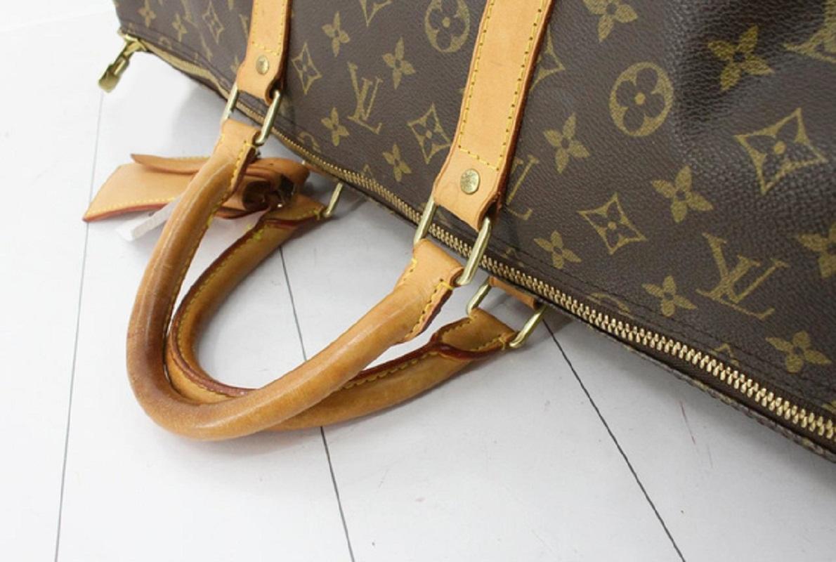 Louis Vuitton Brown Monogram Canvas Leather Keepall 55 cm Duffle Bag Luggage In Good Condition For Sale In Irvine, CA