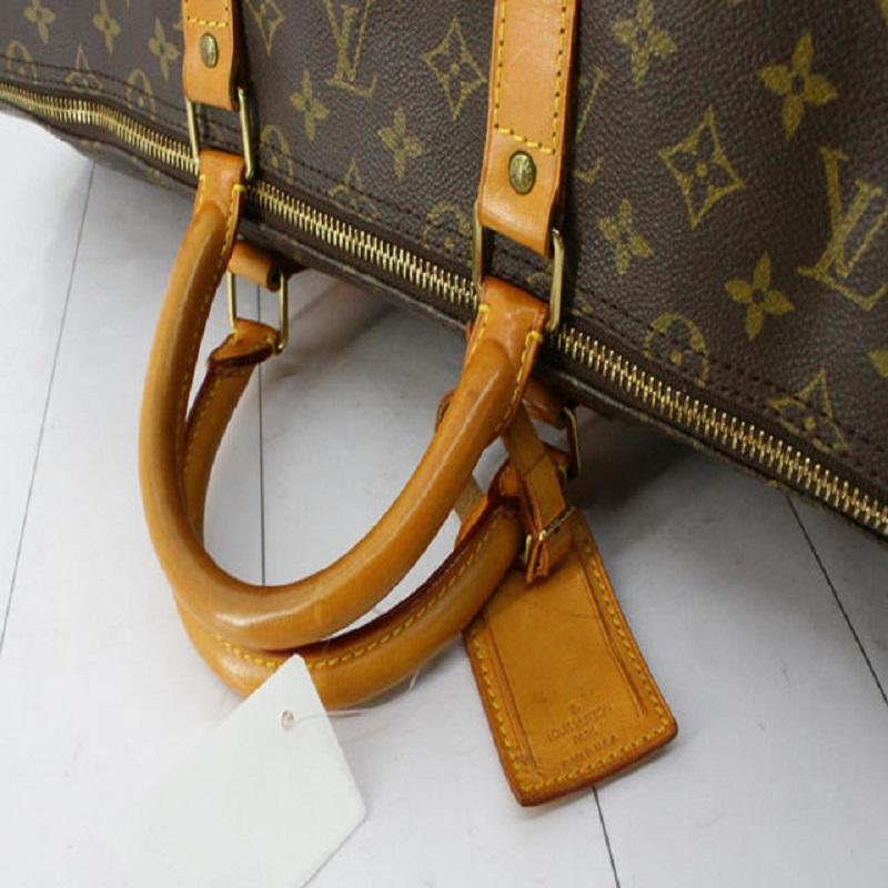 Louis Vuitton Brown Monogram Canvas Leather Keepall 55 cm Duffle Bag Luggage For Sale 1