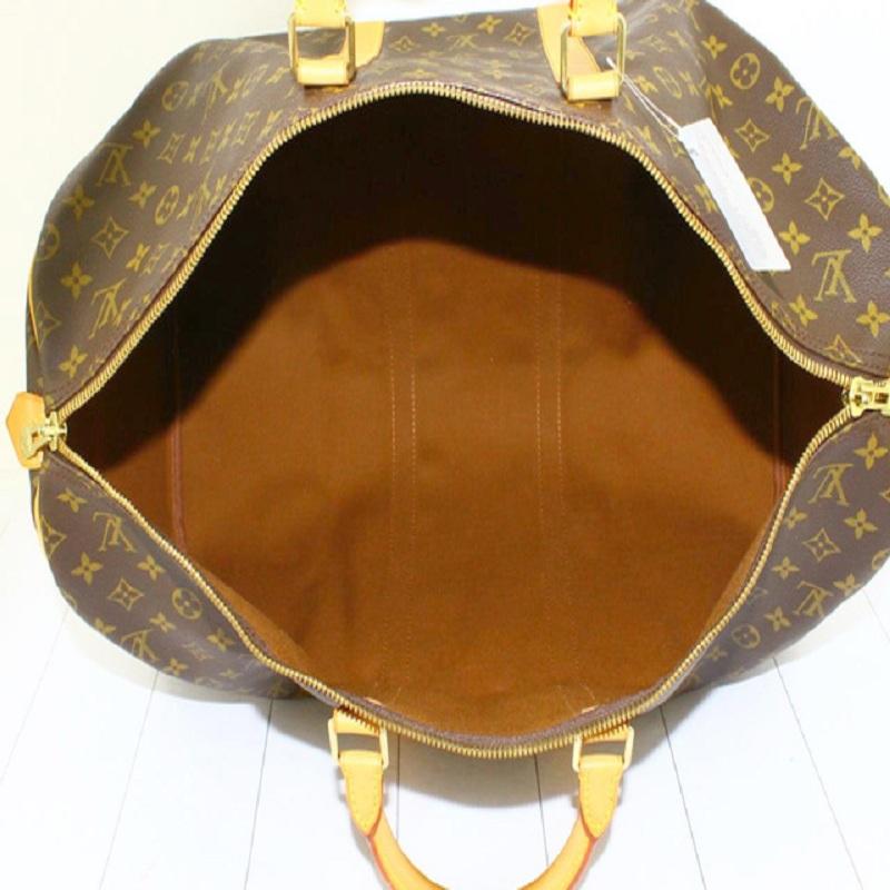 Women's or Men's Louis Vuitton Brown Monogram Canvas Leather Keepall 55 cm Duffle Bag Luggage For Sale