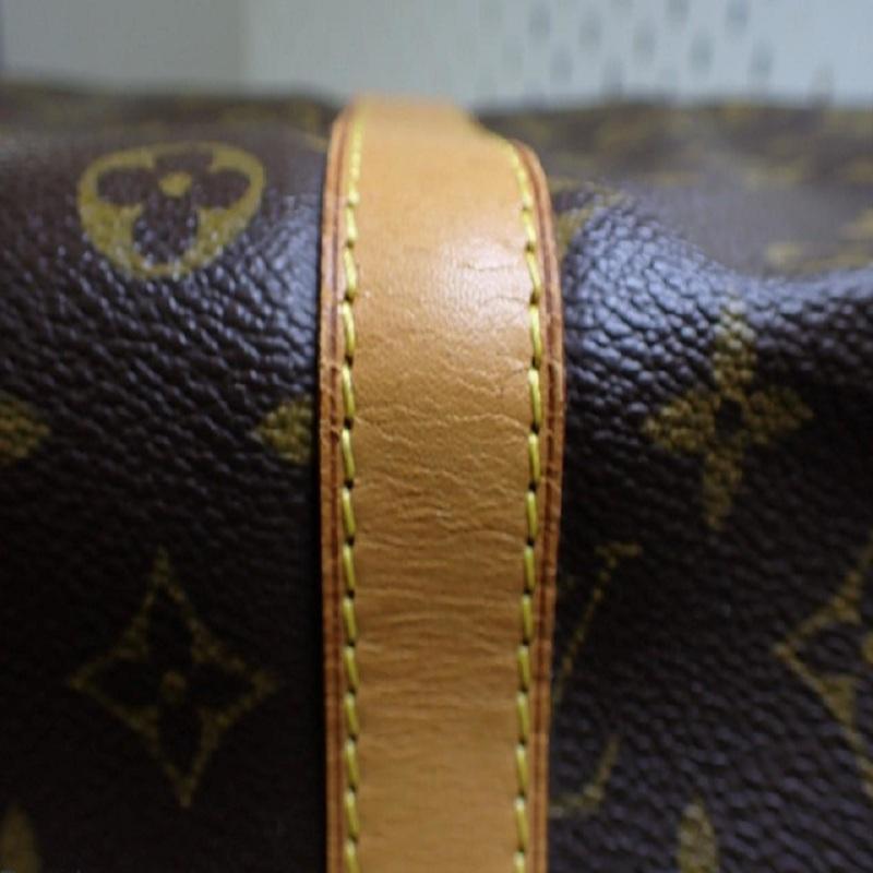 Louis Vuitton Brown Monogram Canvas Leather Keepall 55 cm Duffle Bag Luggage For Sale 1